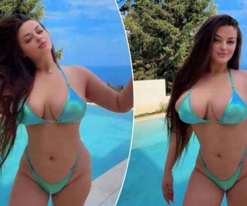 Enca Haxhia mahnit ndjekësit me pamje joshëse pranë pishinës