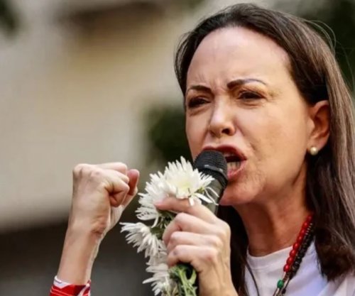 Udhëheqësja e opozitës në Venezuelë zotohet të kthehet në shtëpi